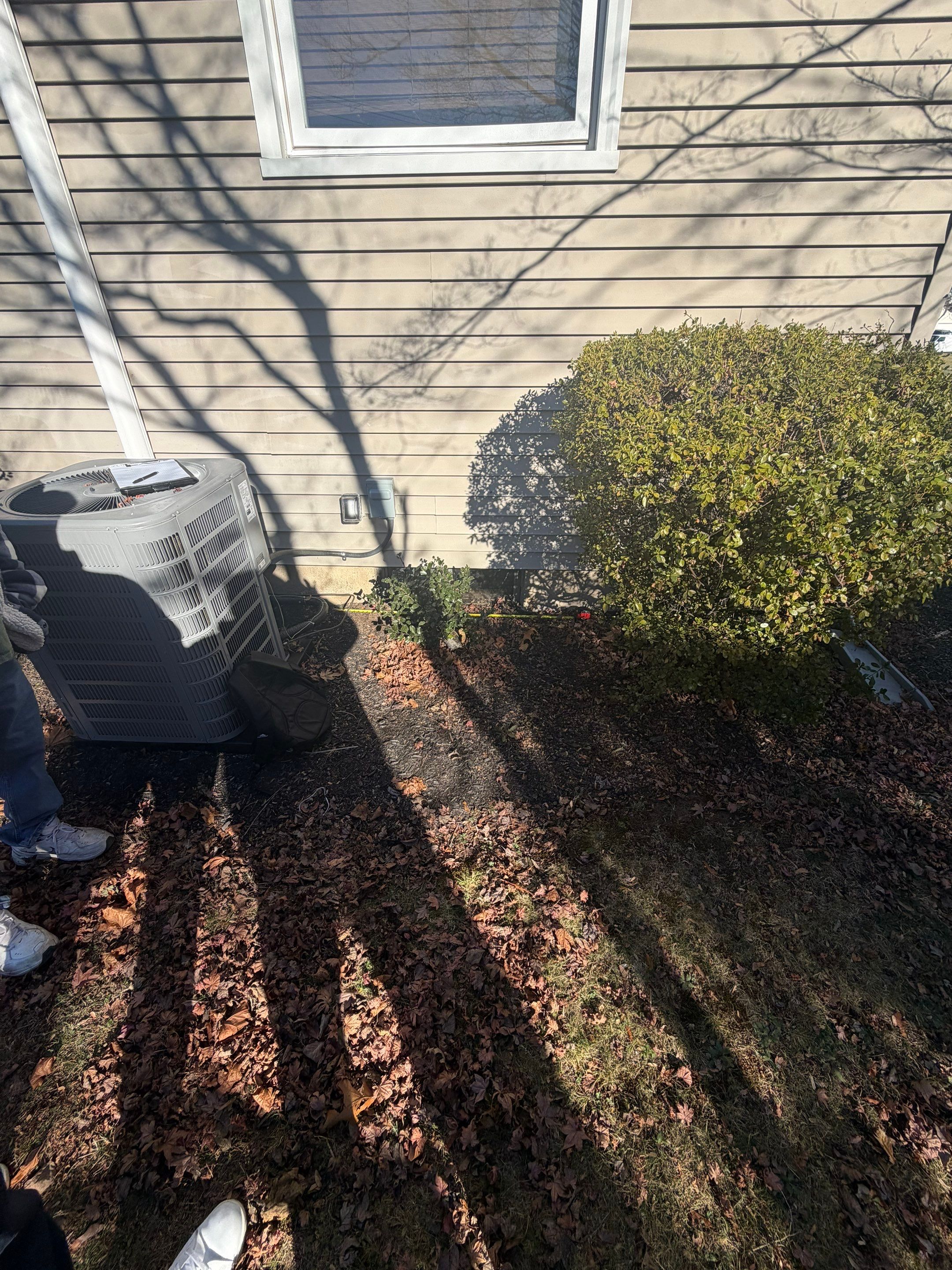 Before egress window installation in Milford, Connecticut — exterior view