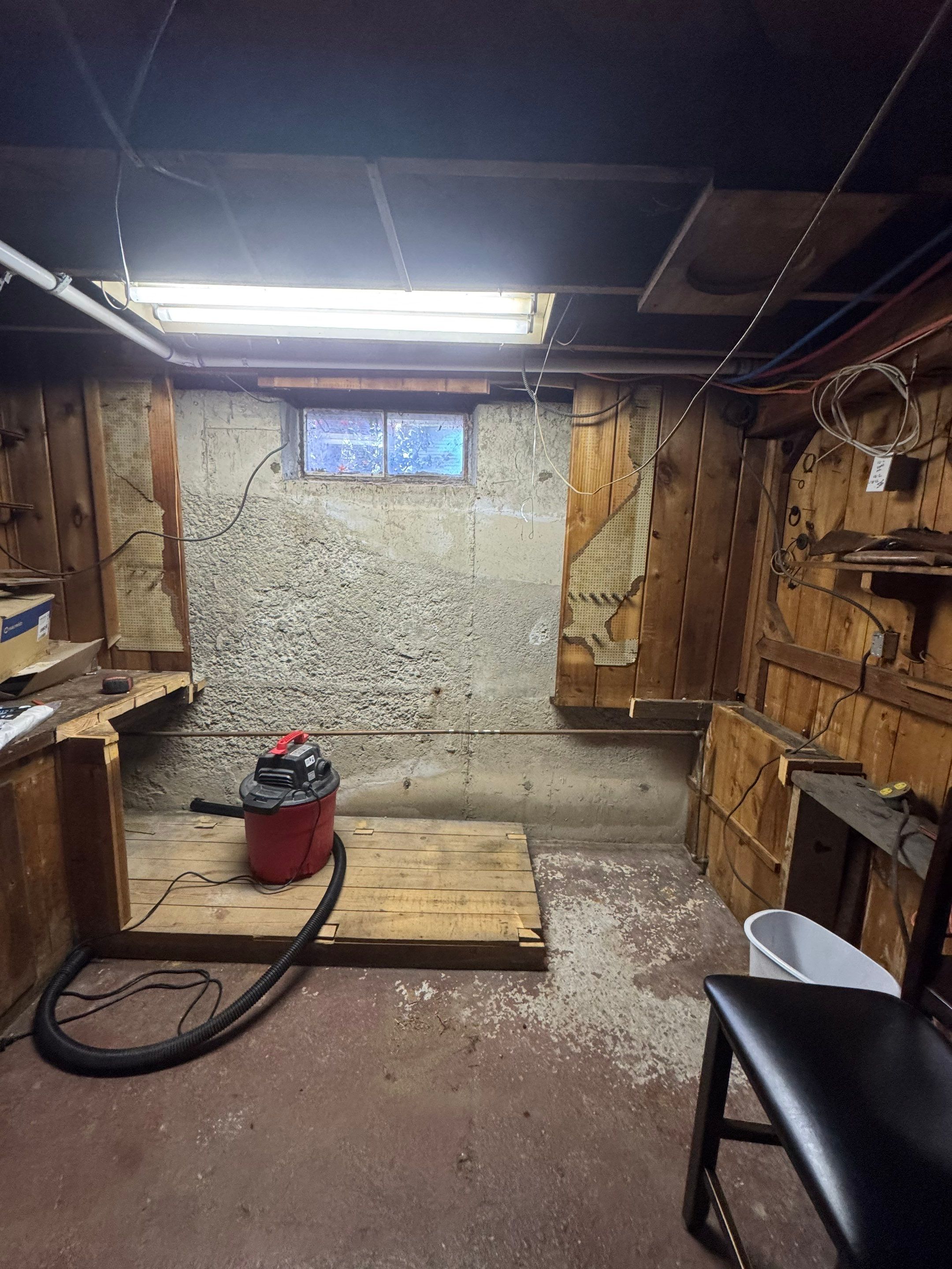 Before egress window installation in Milford, Connecticut — interior view