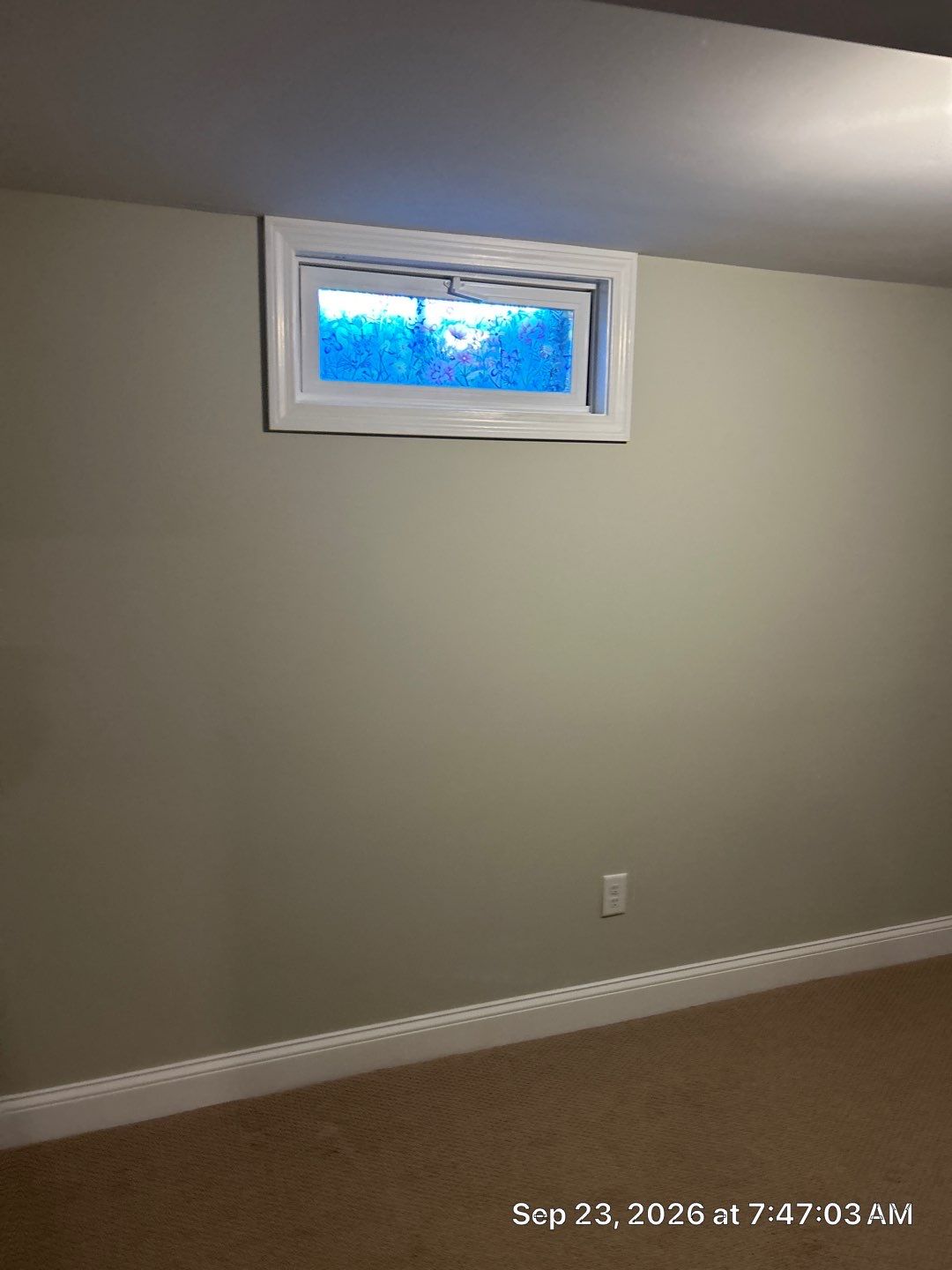 Before: the full original basement window and wall in Waterford, Connecticut