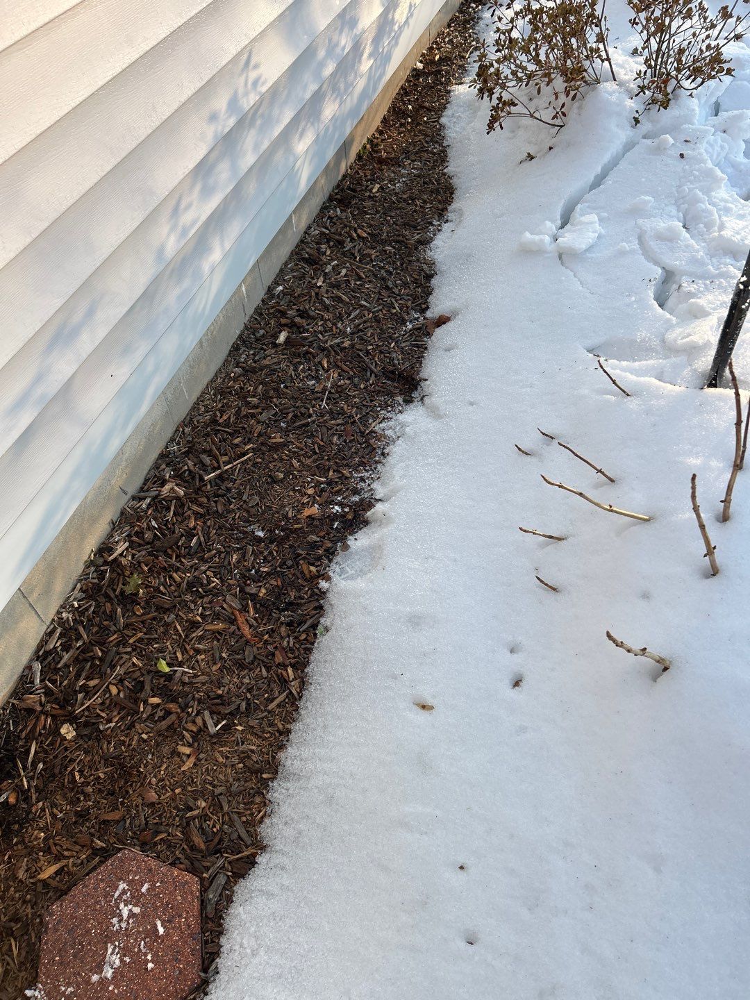Before egress window installation in Madison, Connecticut — exterior view