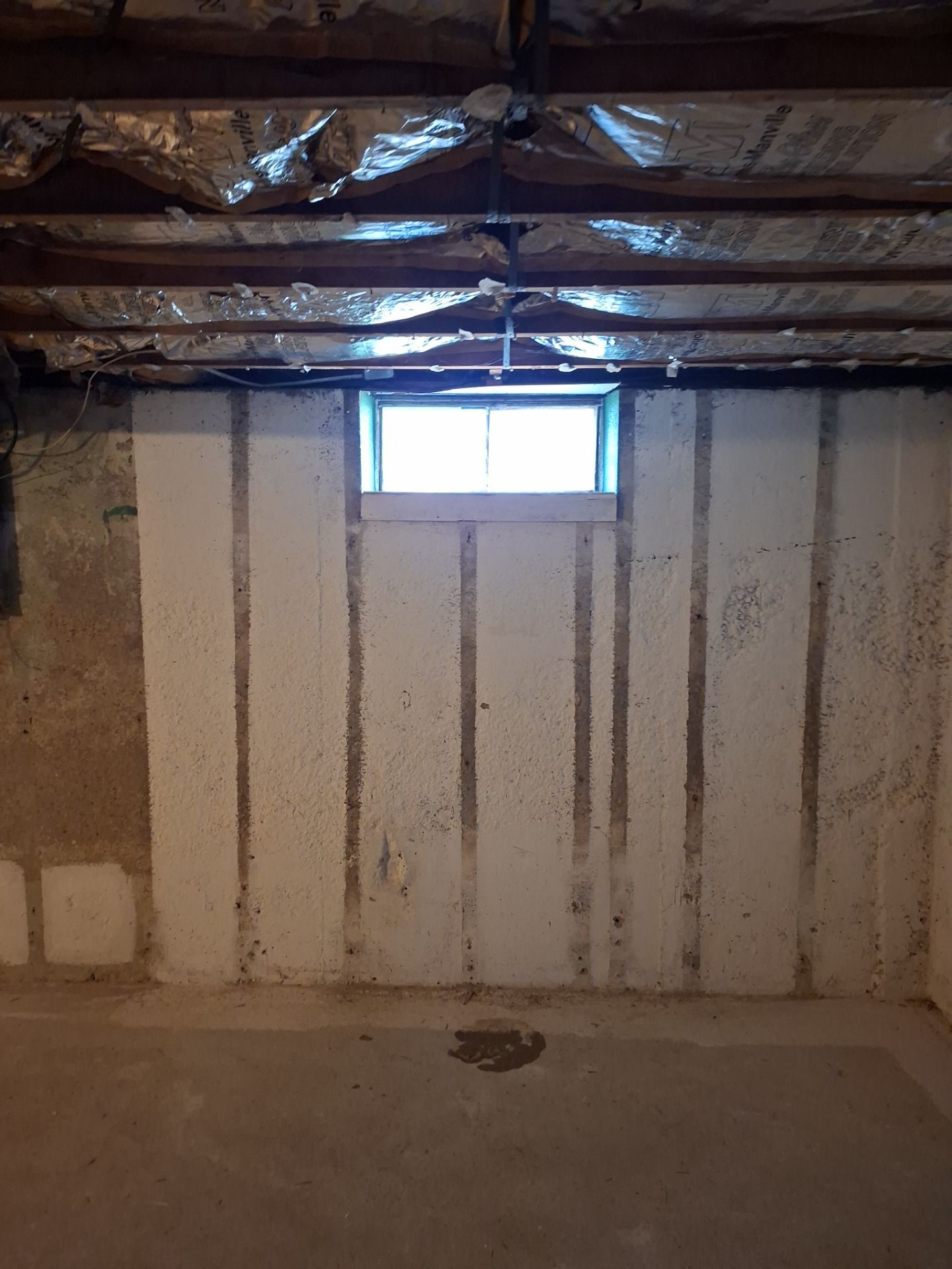 Before egress window installation in Milford, Connecticut — interior view