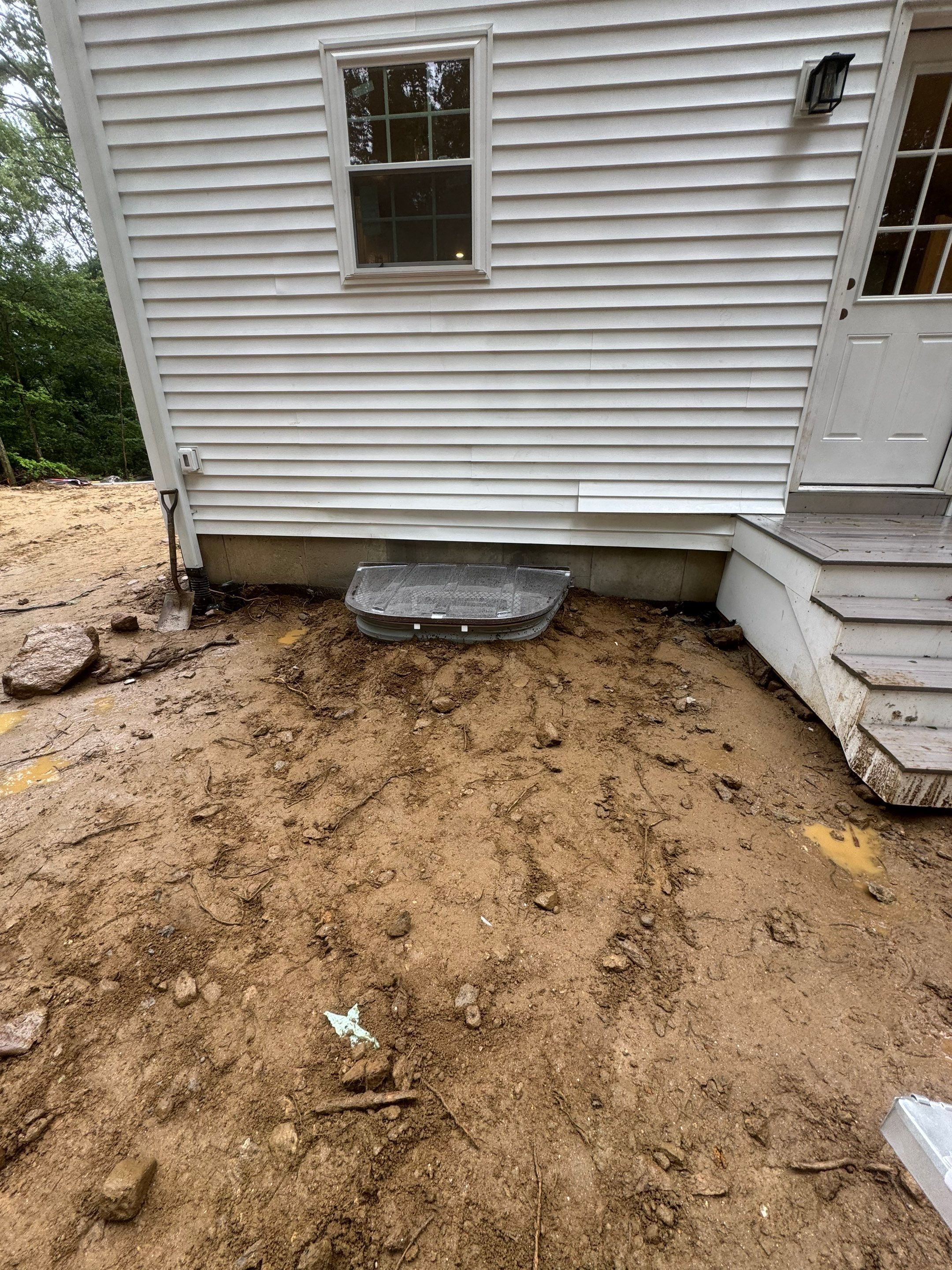 After egress window installation in East Haddam, Connecticut — exterior view