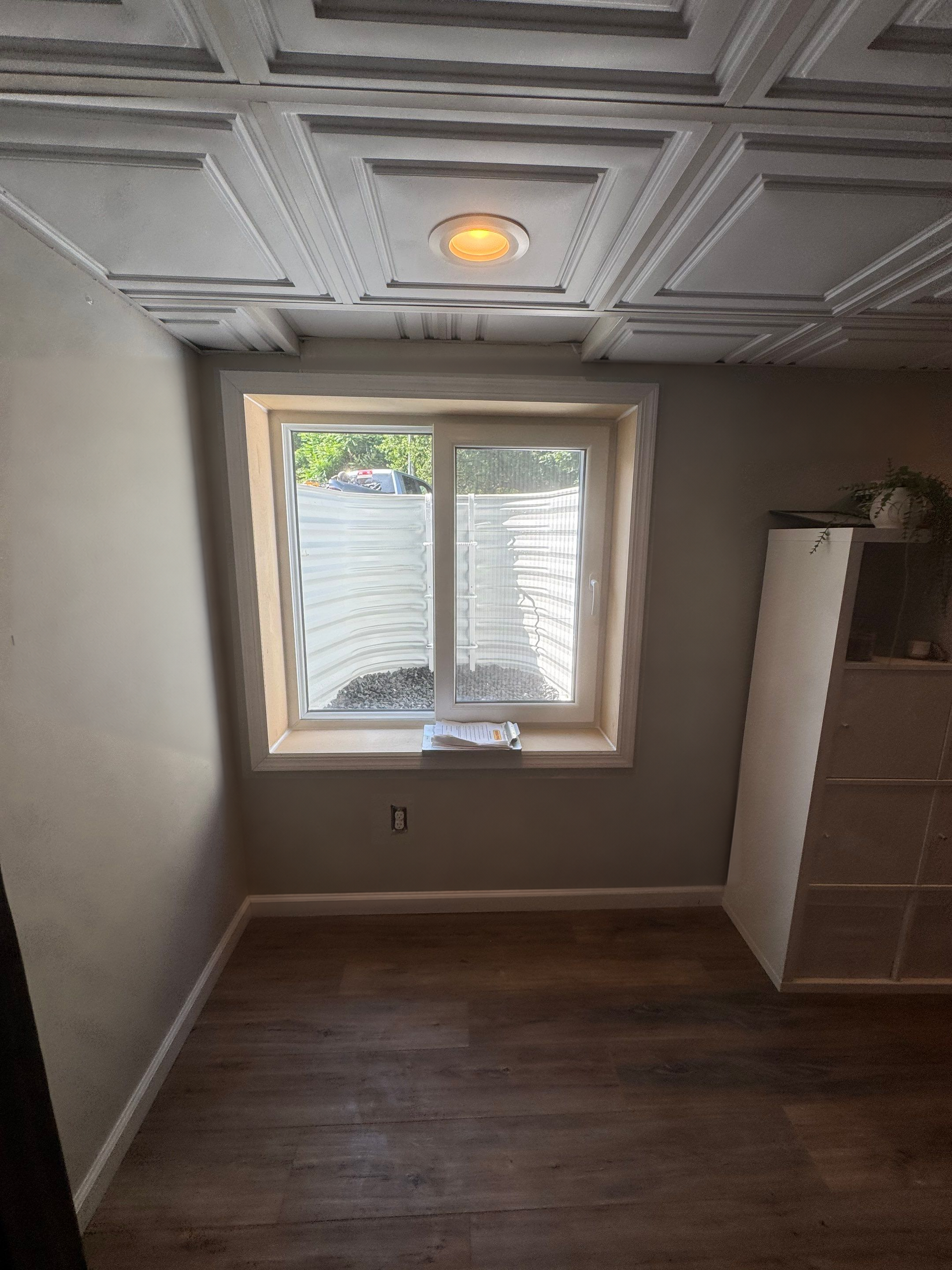 Completed basement egress window and well in Glastonbury, Connecticut