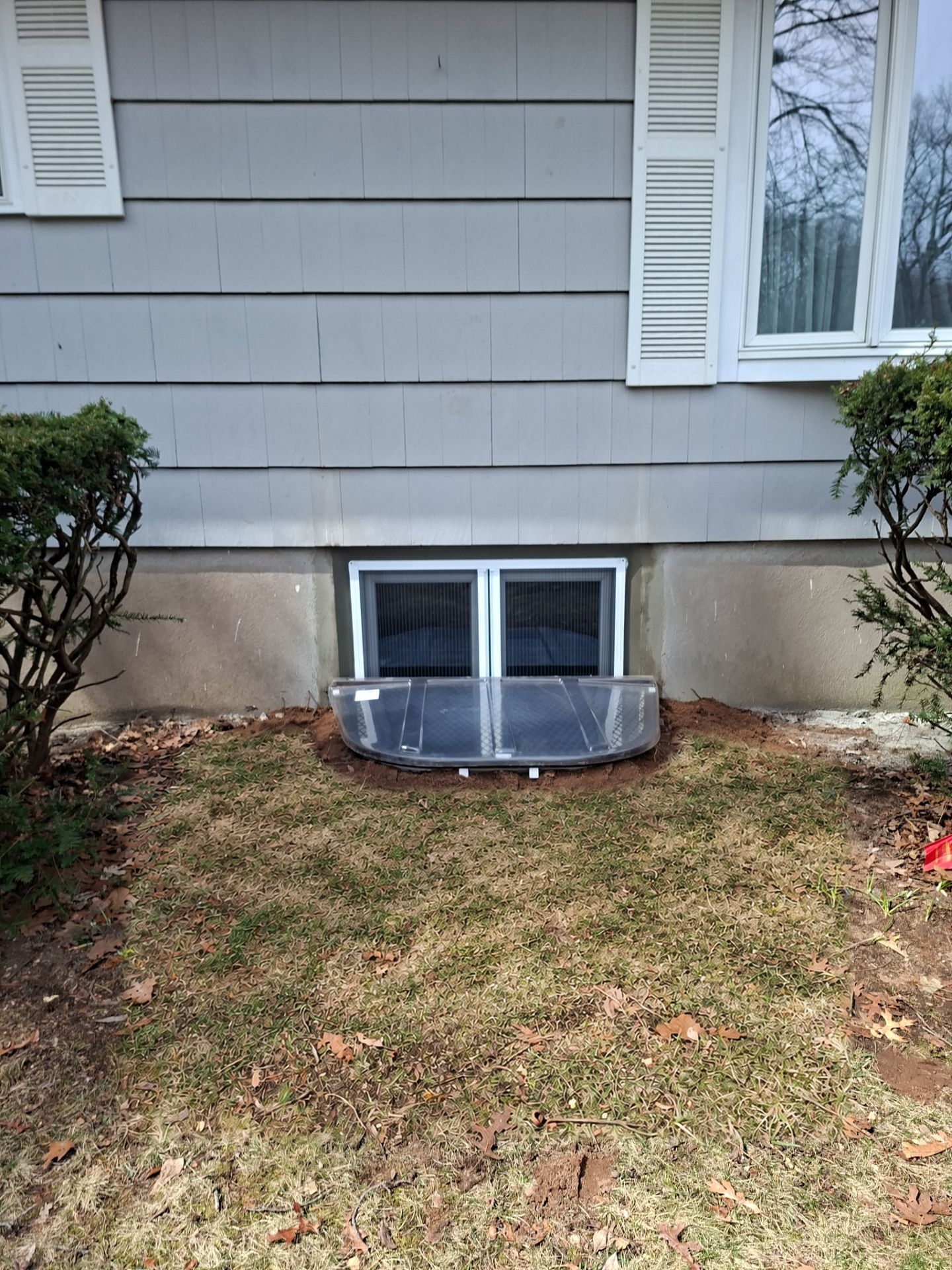 After egress window installation in North Haven, Connecticut — exterior view
