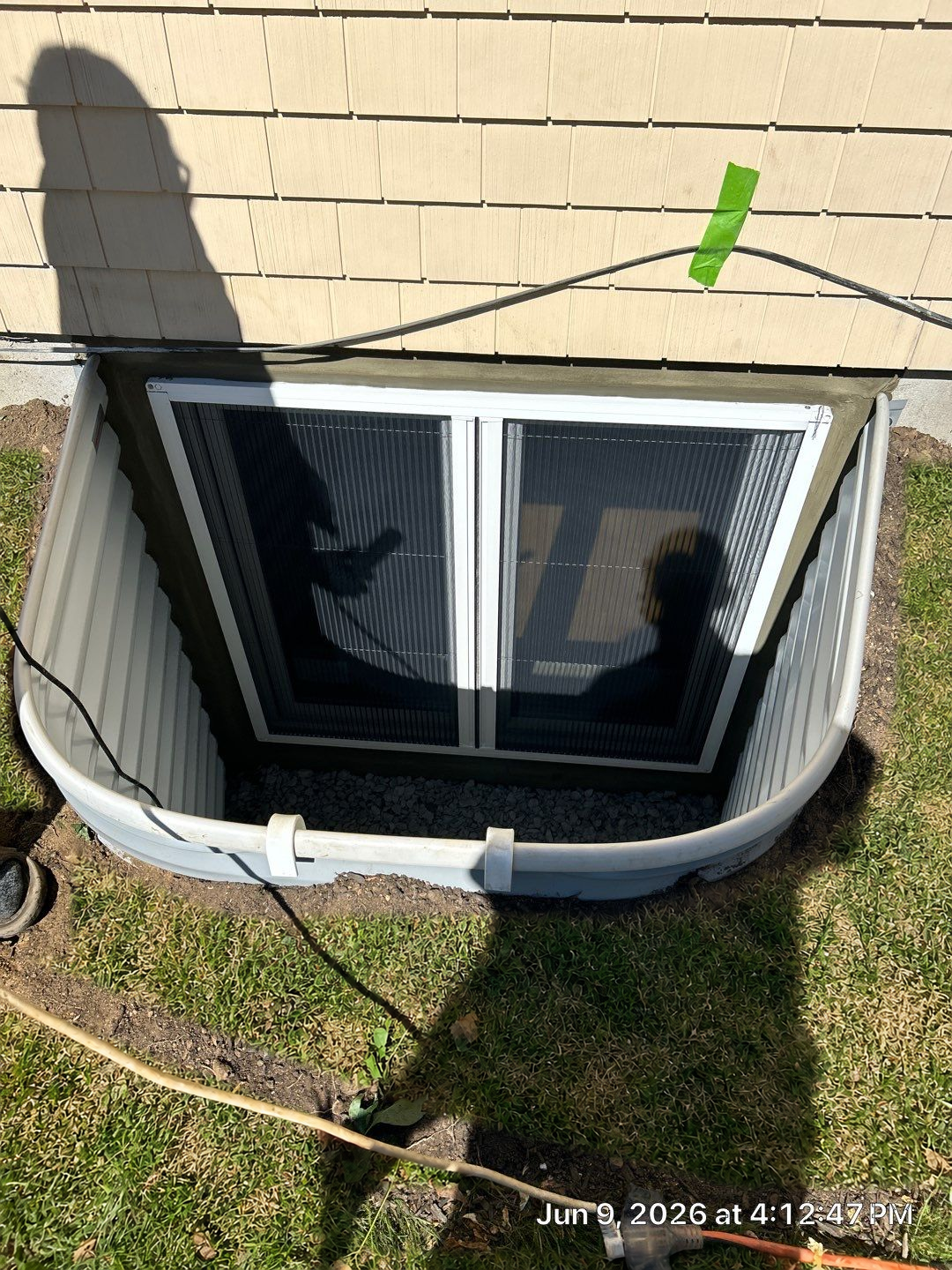 After egress window installation in Trumbull, Connecticut — exterior view